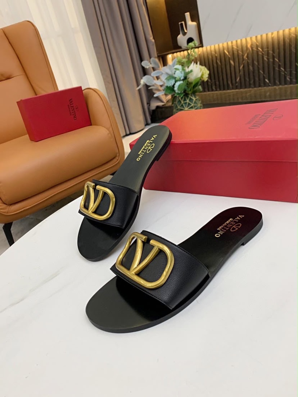 Valentino Garavani Black Leather Slide Sandals with Gold V Logo